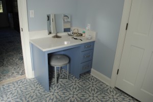 Dunes West, Master make-up seating area, with custom countertop, and Sherwin-Williams Daphne colored cabinets.