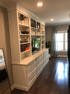 Hidden Cove, TV and wardrobe cabinets, custom countertop, outlets in countertop.