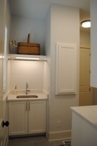 Mt Pleasant, Custom laundry sink w/ Shelf and bar.  Electrical cover frame and door.