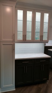 Isle of Palms, tall Kitchen Storage, with with glass door uppers and interior lighting.