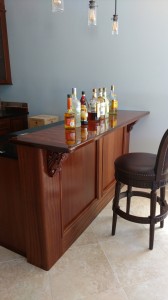 Drew, Custom bar with burled wood top and solid sapele wood finishes