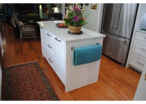 Snee, Kitchen Island with double trash pullouts and 3 drawer bank
